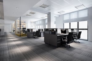 Modern office conference room with video conferencing display and collaborative setup